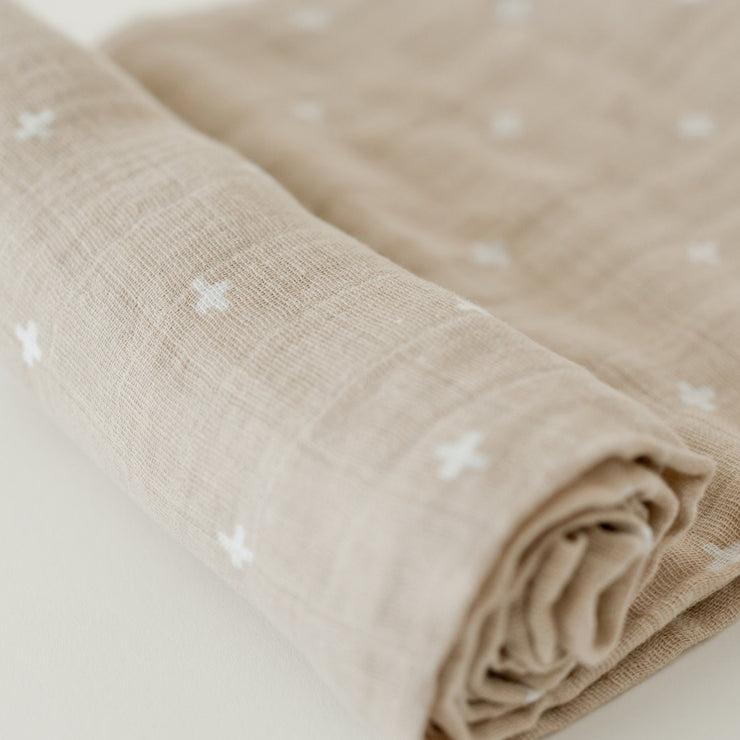 Little Unicorn Cotton Muslin Swaddle Blanket | Taupe Cross