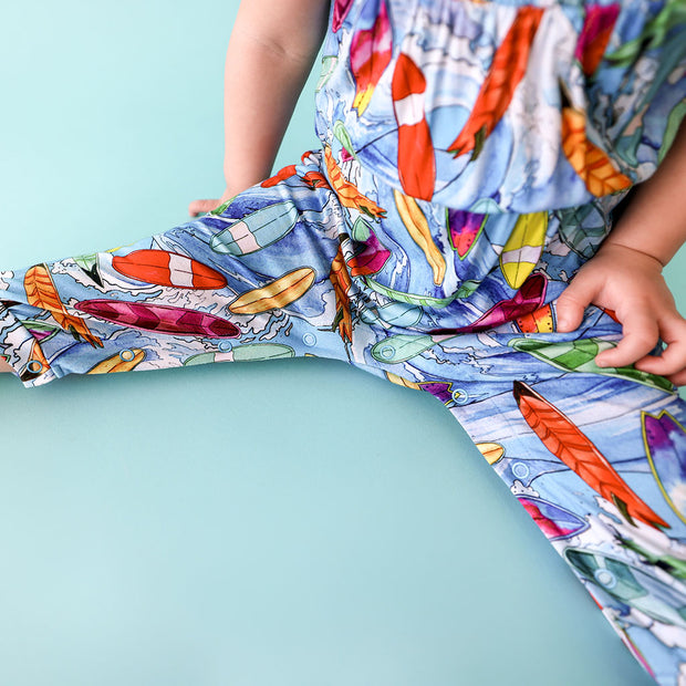 Posh Peanut Smocked Spaghetti Jumpsuit | Wave