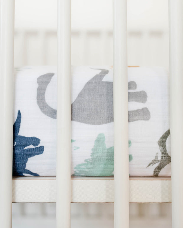 Little Unicorn Cotton Muslin Crib Sheet | Dino Friends